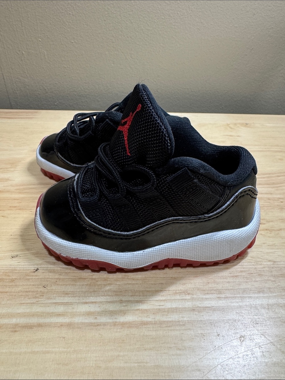 Air Jordan 11 Retro Black and Red Sneakers